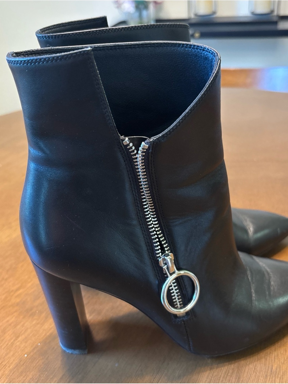 PAIGE Black Leather Ankle Booties with Ring Zip Accent